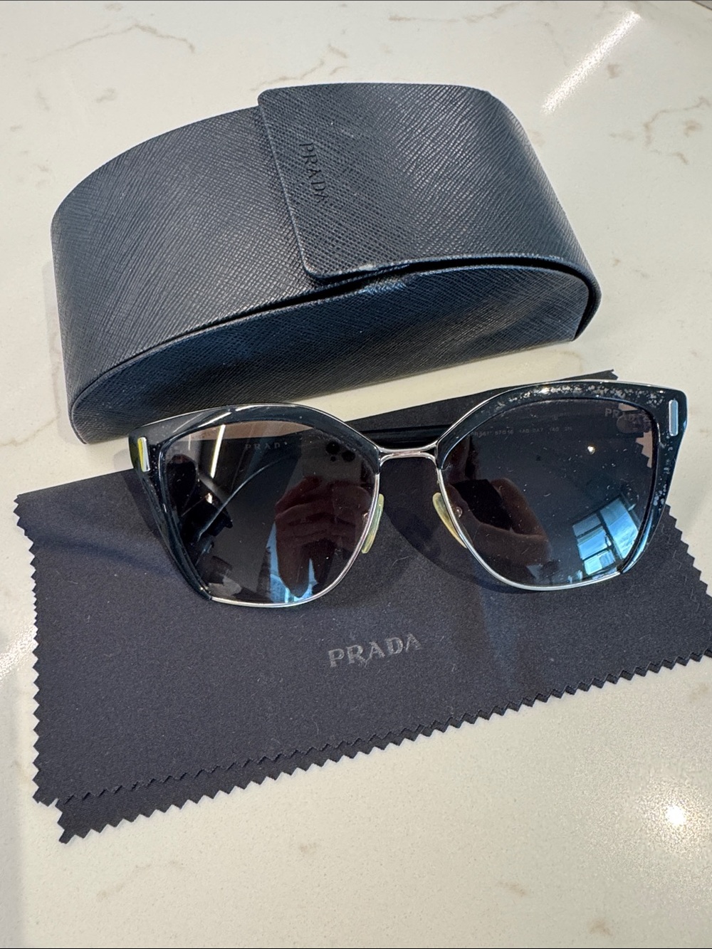 Prada Black Cat-Eye Sunglasses with Gradient Lenses